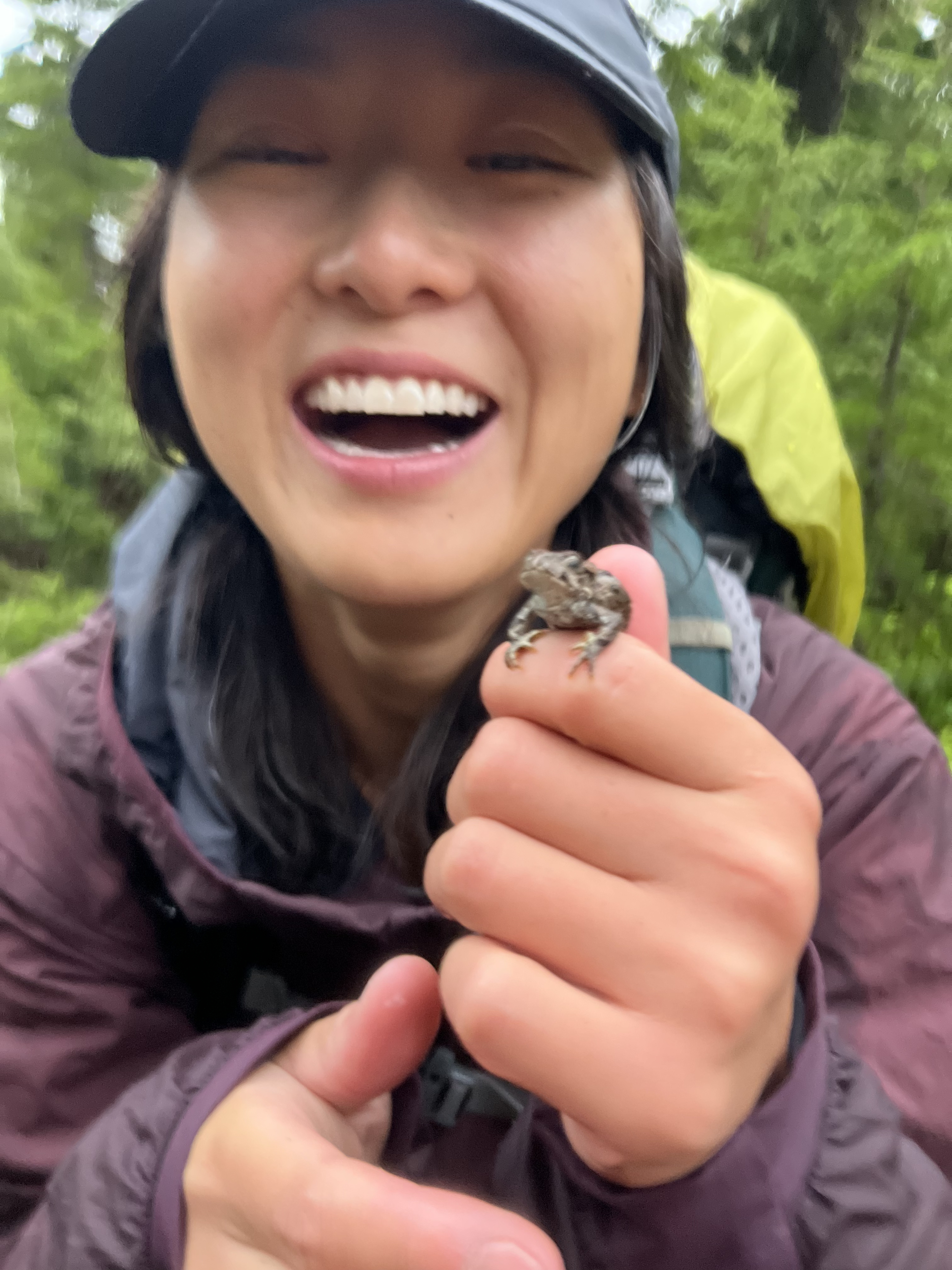 Julie holding frog friend